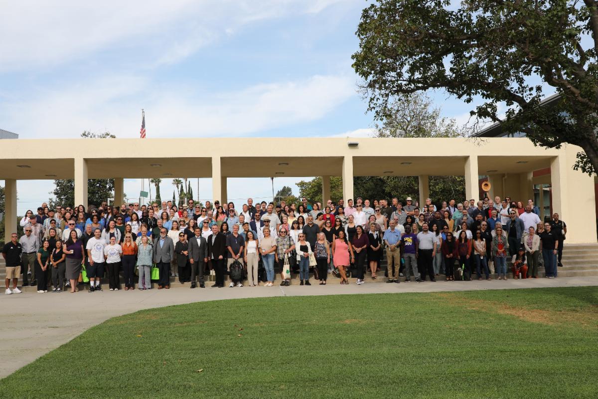 LAVC Faculty pose for a group photo on stairs above Monarch Square