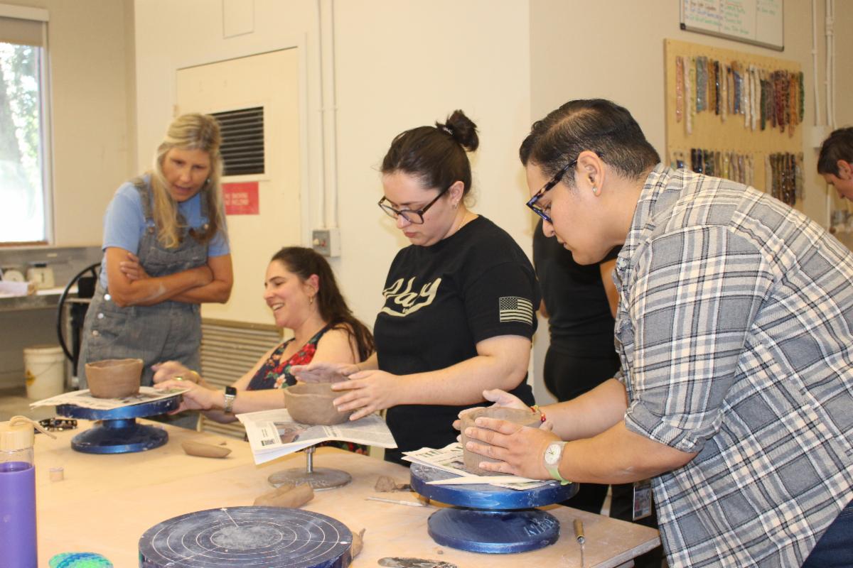 LAVC veterans, LGBTQIA students and staff create pottery at the ceramics event