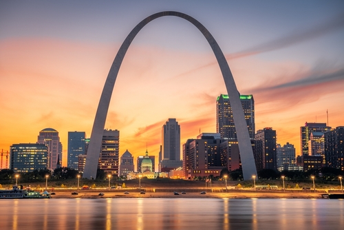 St. Louis_ Missouri_ USA downtown cityscape on the river at dusk.