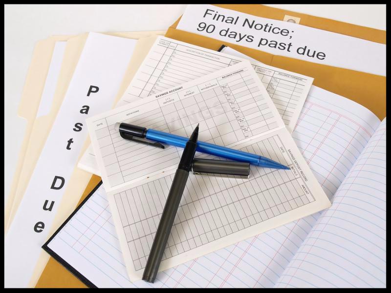 Past due and final notices the debt never ends. Over white.