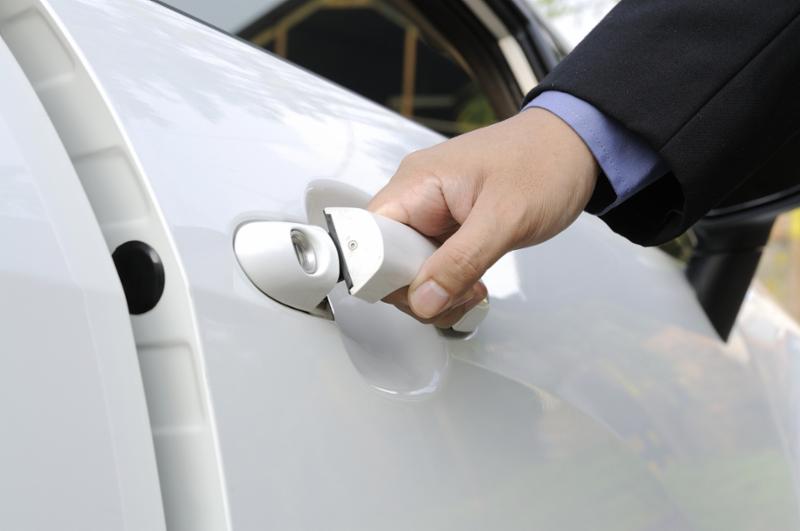 opening_white_car_door.jpg