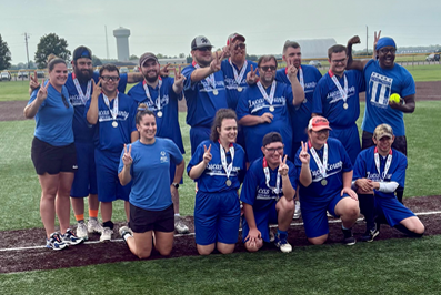 Lightning Coach Pitch Softball Team posing with Silver medals
