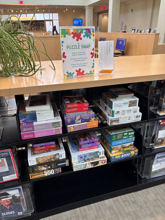 Photo of puzzles on bookshelves