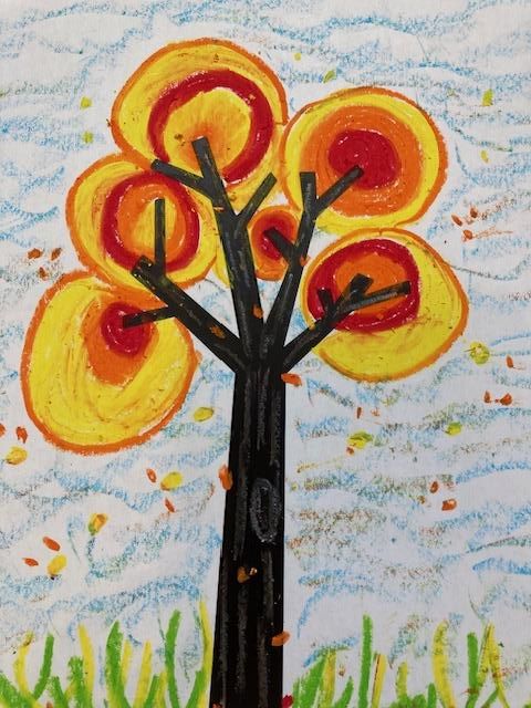 A child's crayon drawing of a tree