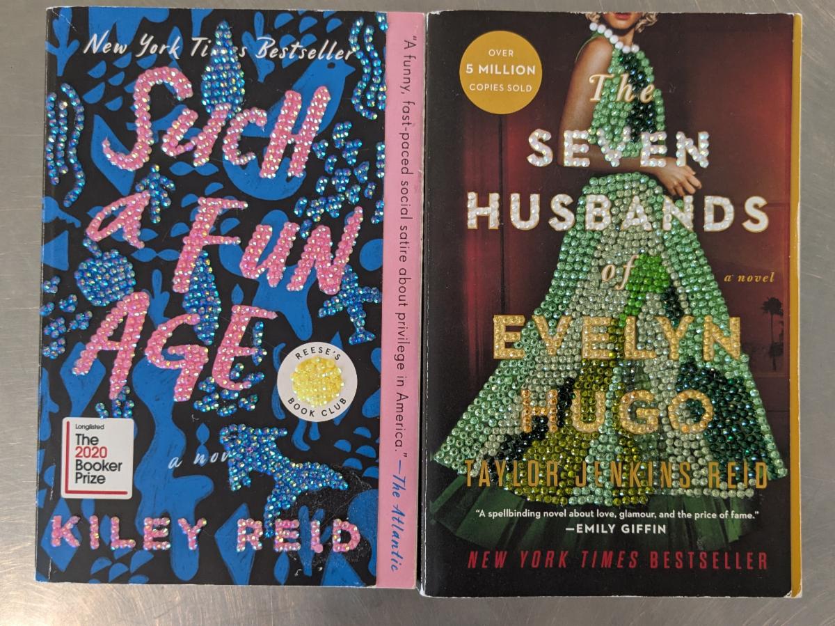 Photo of two books decorated and accented with crystals