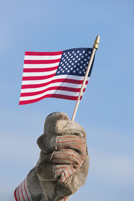 Work glove holding a flag