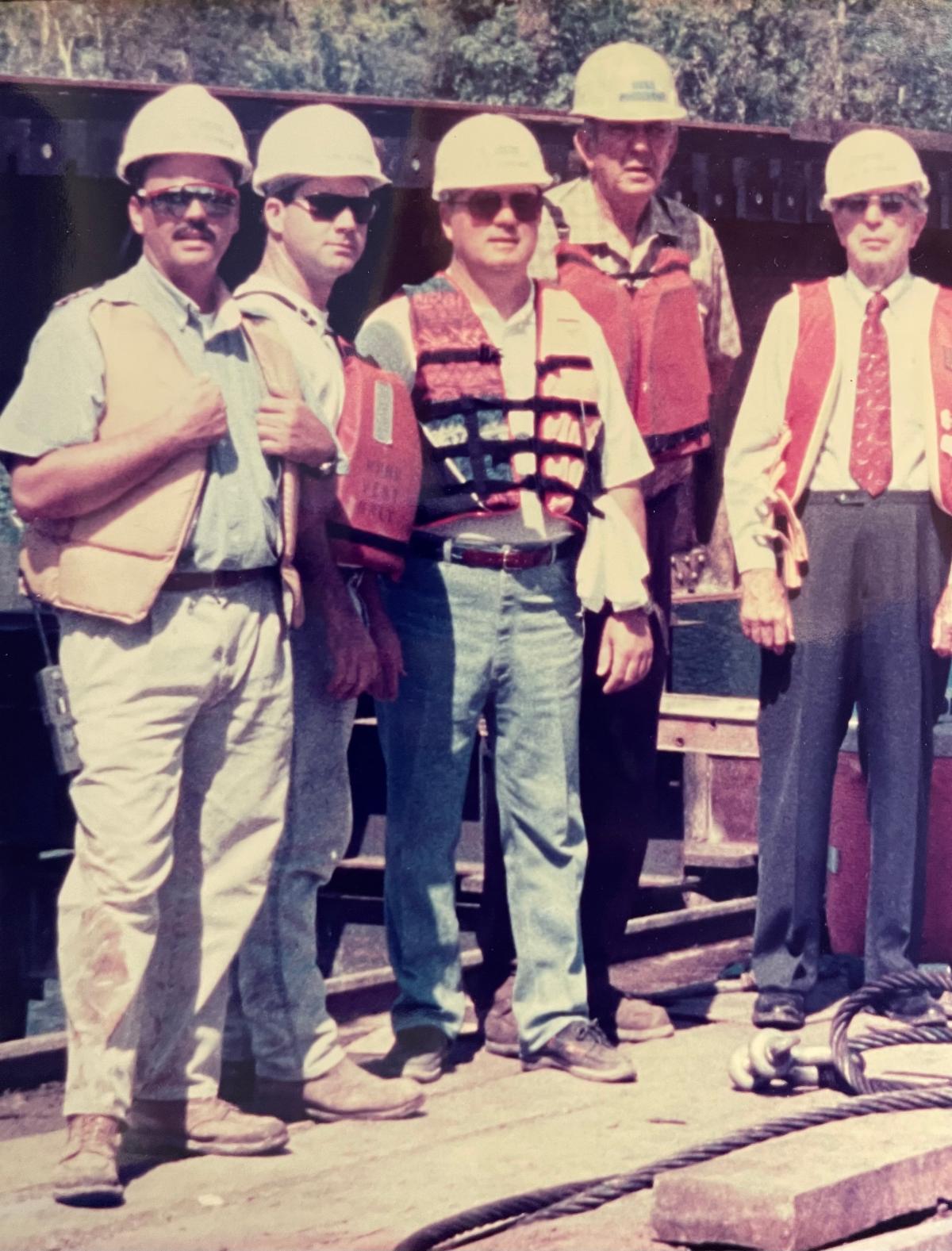Five construction men in old photo