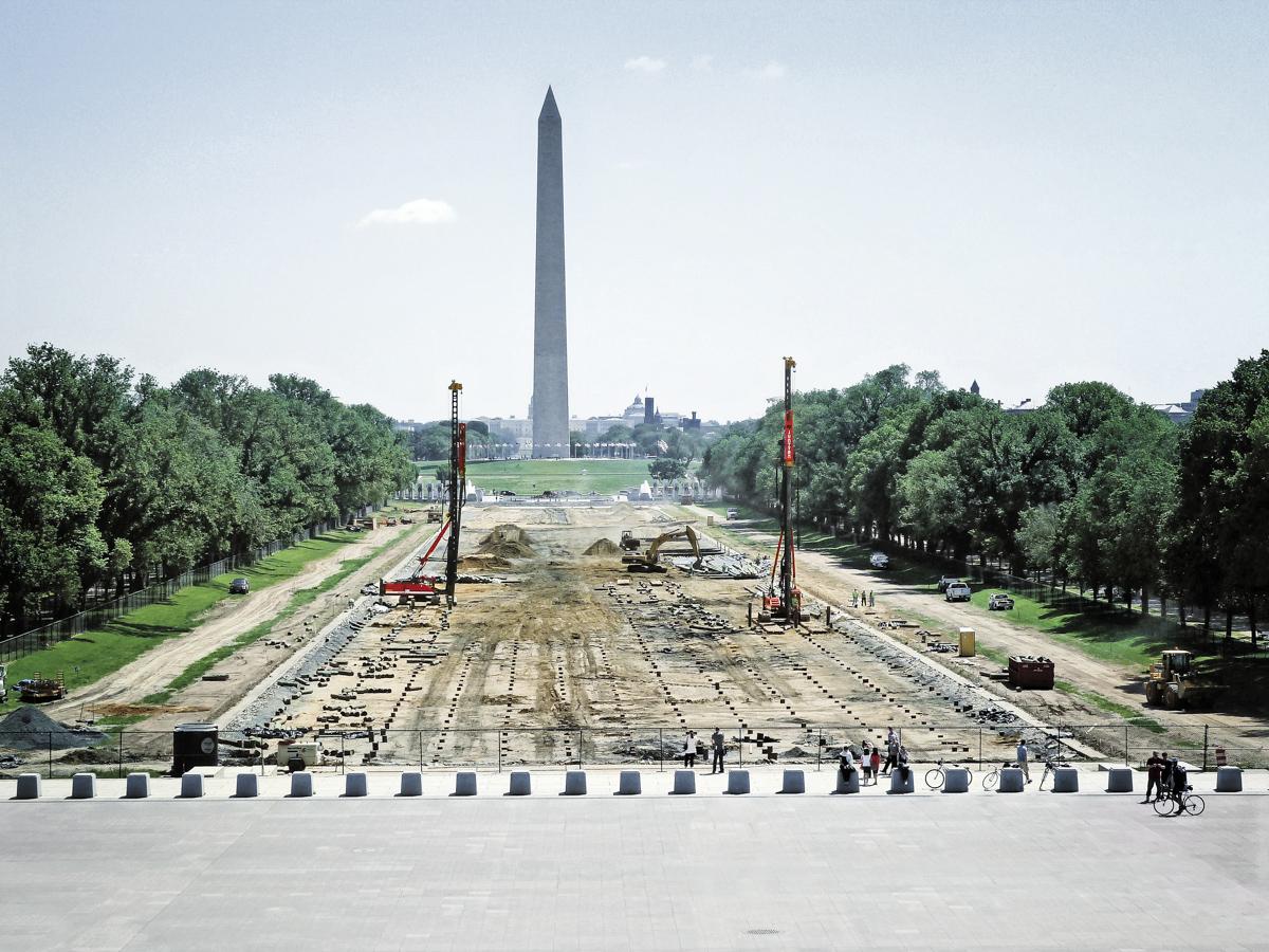 Pile drivers in front of Washington Monument
