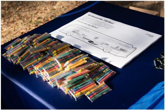 Photo of coloring page of the Fairfax Connector Route 798 bus and crayons.