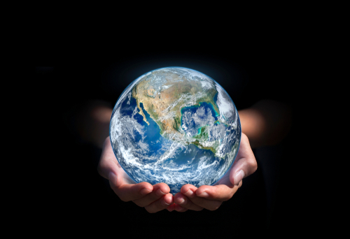 earth in hands. green planet on hand. save of earth. environment concept for background web or world guardian organization.Elements of this image furnished by NASA