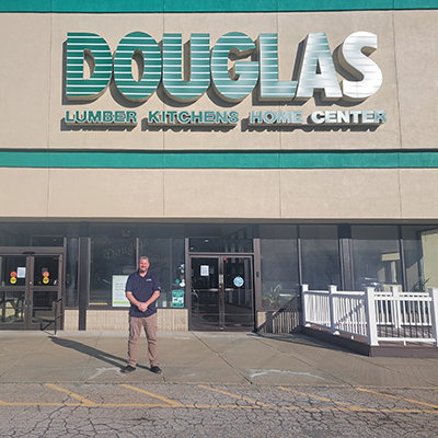 Douglas Lumber store front with Dave Geer, General Manager