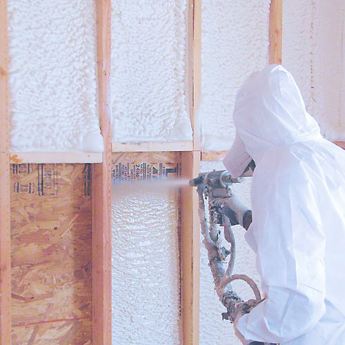 Pro Insulators installing spray foam insulation