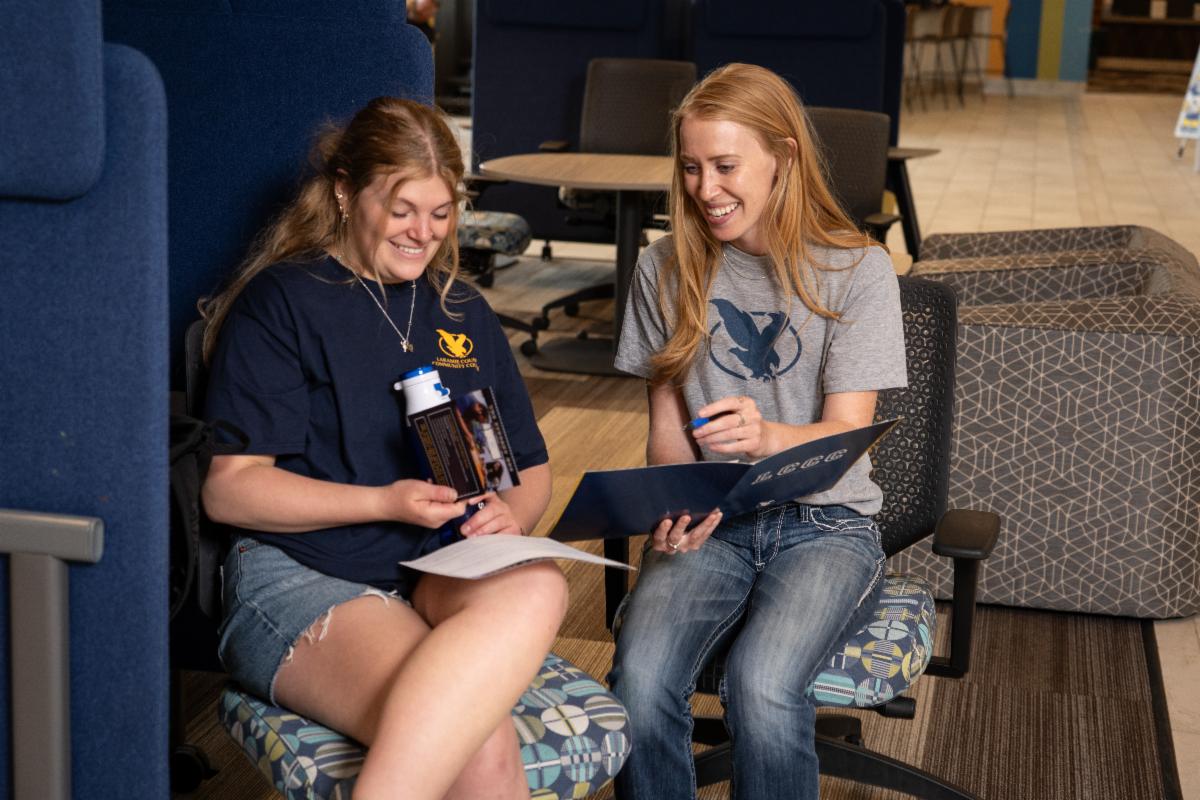 A Student Success Coach meets with a student to discuss LCCC programs, class options, and academic planning in a supportive and welcoming environment.
