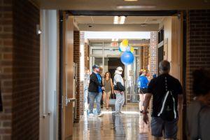 Students gathering in the lobby of Blue Hall.
