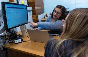 SSC with student in their office
