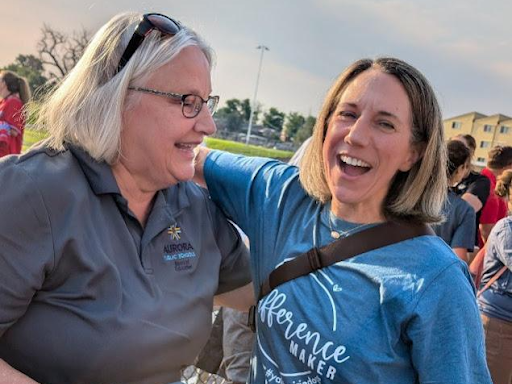 board member debbie gerkin with staff member at aps all staff kickoff