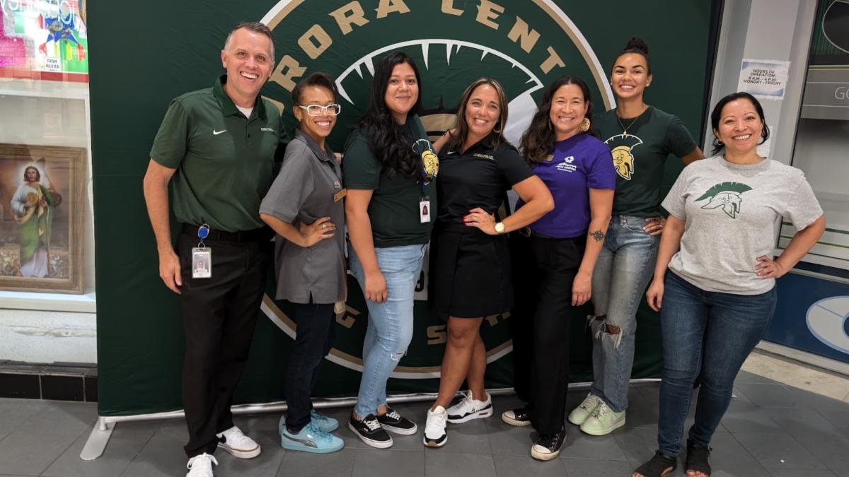 Principal Kurtis Quig (left) and his leadership team with Board Treasurer Tiffany Tasker (second from left) and Board Secretary Danielle Tomwing (third from right)