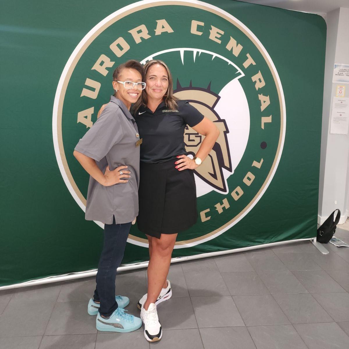 Board Treasurer Tiffany Tasker and Aurora Central High School Assistant Principal Angelique Green