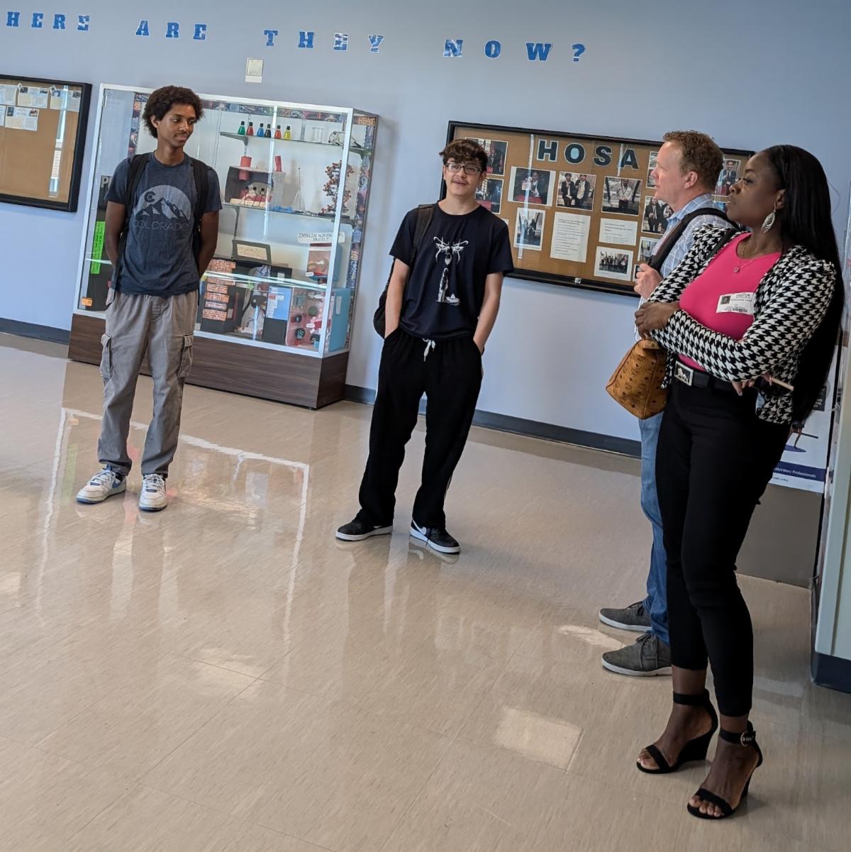 Hinkley High School students presenting with APS Foundation board members