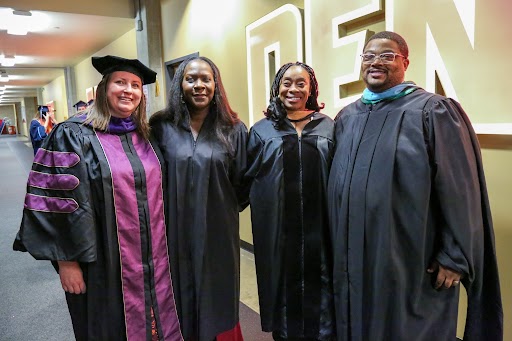 Board members Mallory, Charrier, Keke and Duncan at graduation ceremonies
