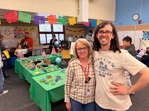 APS Board member Vicki Reihnard at left with a Clyde Miller teacher attending the Clyde Miller carnival