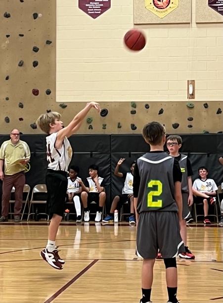 quest vs. murphy creek basketball game