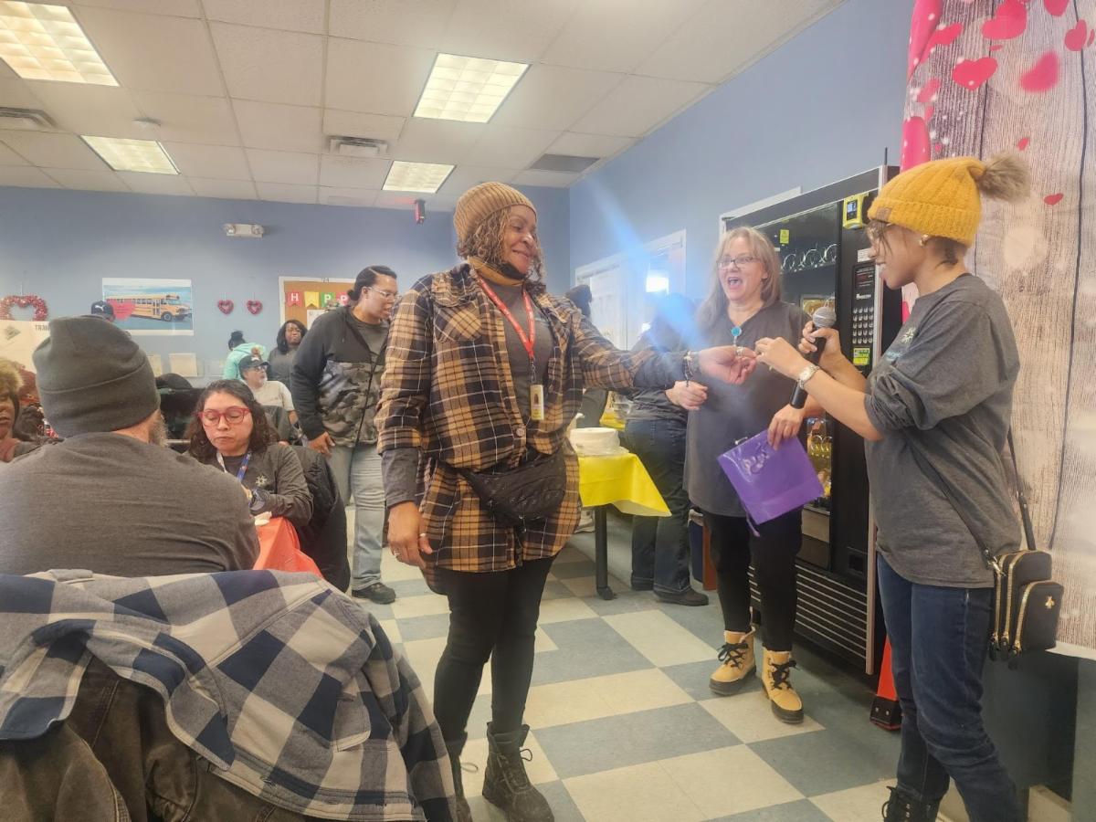Bus drivers receiving awards at Love the Bus Day