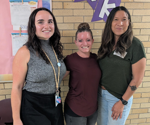 boe member tomwing with two montview teachers