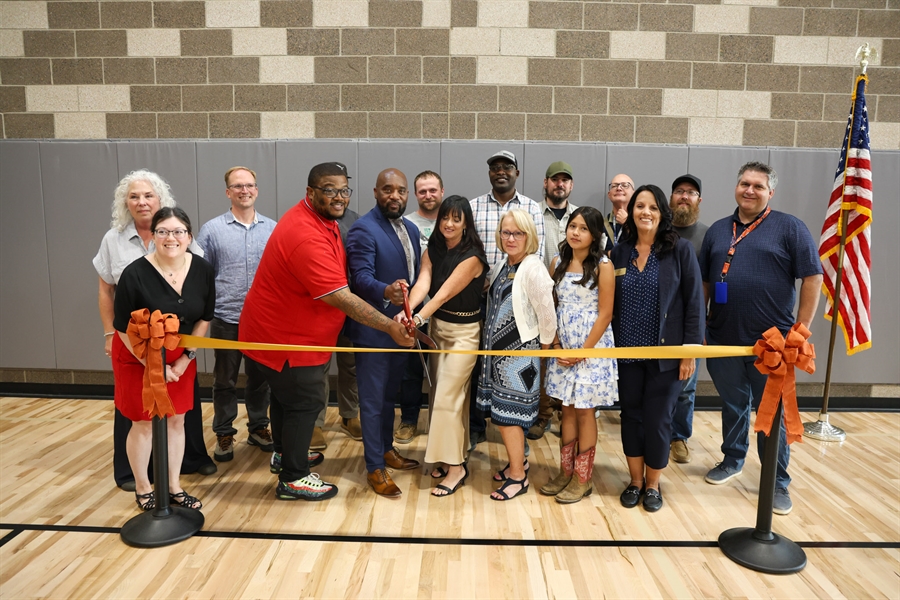 Board President Tramaine Duncan, APS Superintendent Michael Giles, Jr., Coal Creek P-8 Principal Megan Ortiz-Capozollo and Board Treasurer Vicki Reinhard help cut the ribbon at the Coal Creek P-8 Grand Opening.