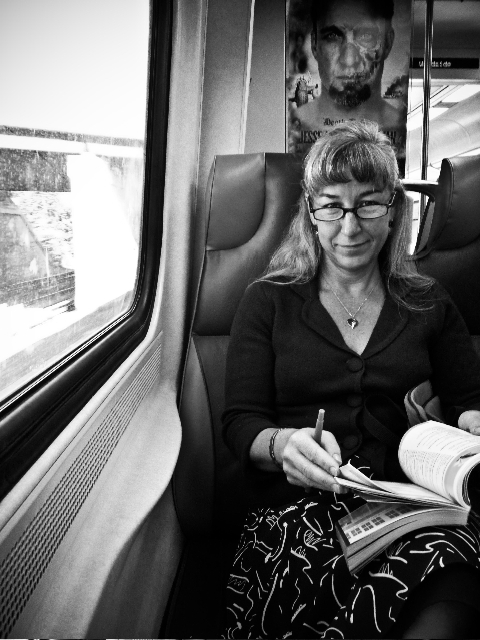 Deanna on a train