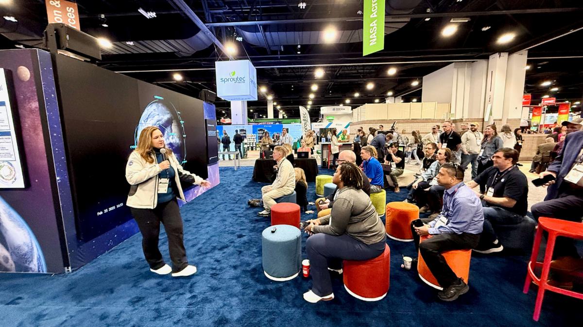 NASA Earth Science Division Director Karen St. Germain speaks to a group of attendees at Commodity Classic