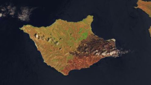 A false-color image of Santa Rosa Island from May 24, 2026, shows a reddish-brown burned area spanning the eastern third of the island.