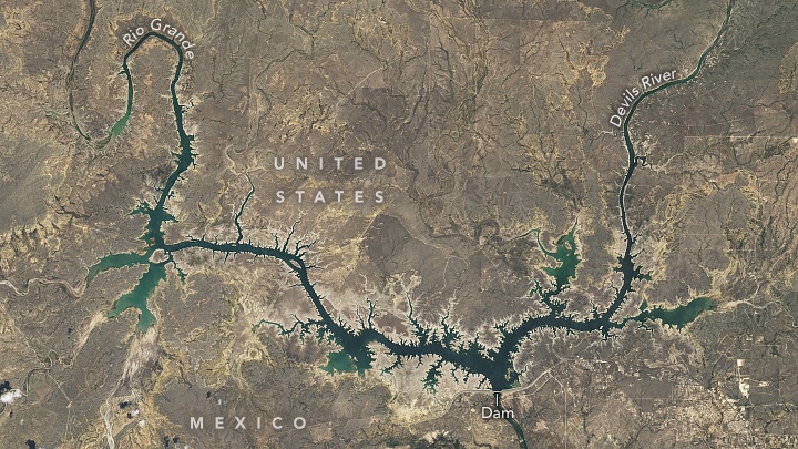 A natural-color Landsat 9 satellite image of the Amistad reservoir in southern Texas and Northern Mexico. This image was acquired on August 19, 2024 after drought had caused the reservoir to hit record-low levels. 