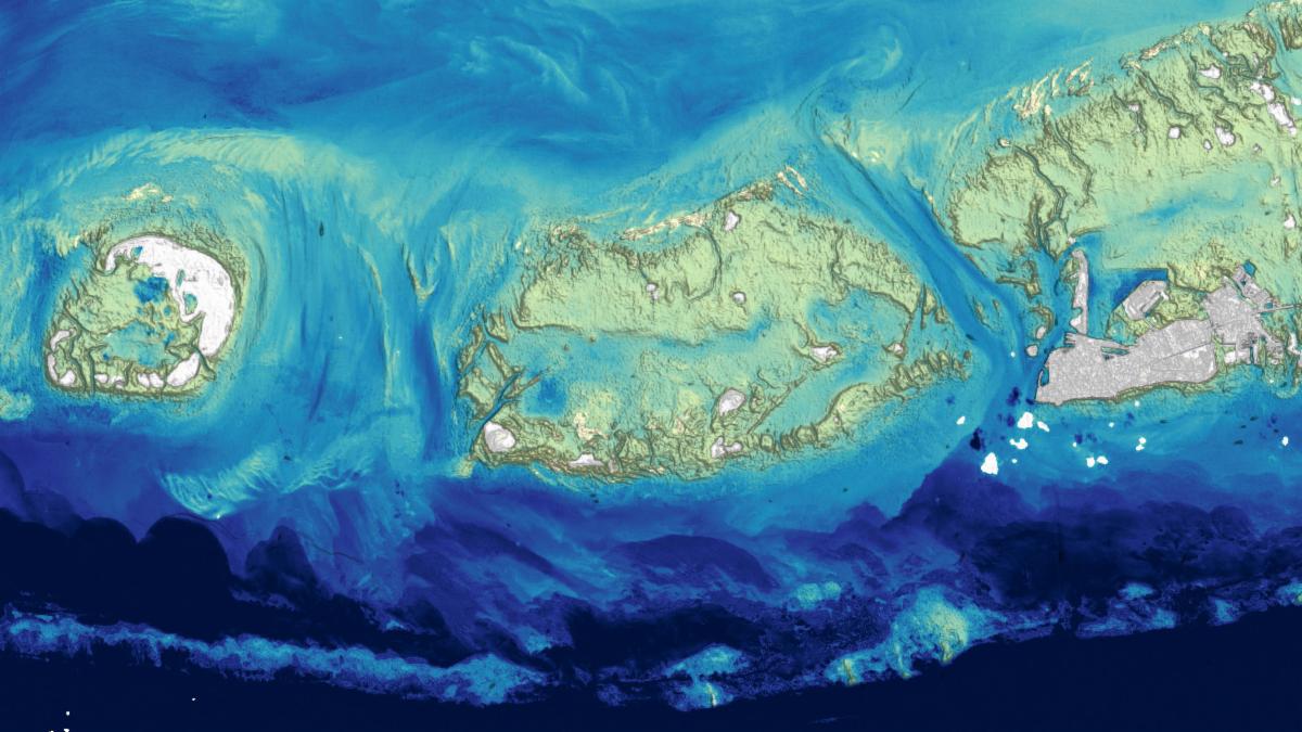 Image shows bathymetry measurements around Key West, Florida. Shallower regions around the Key are in light green, whereas deeper waters are in dark blue