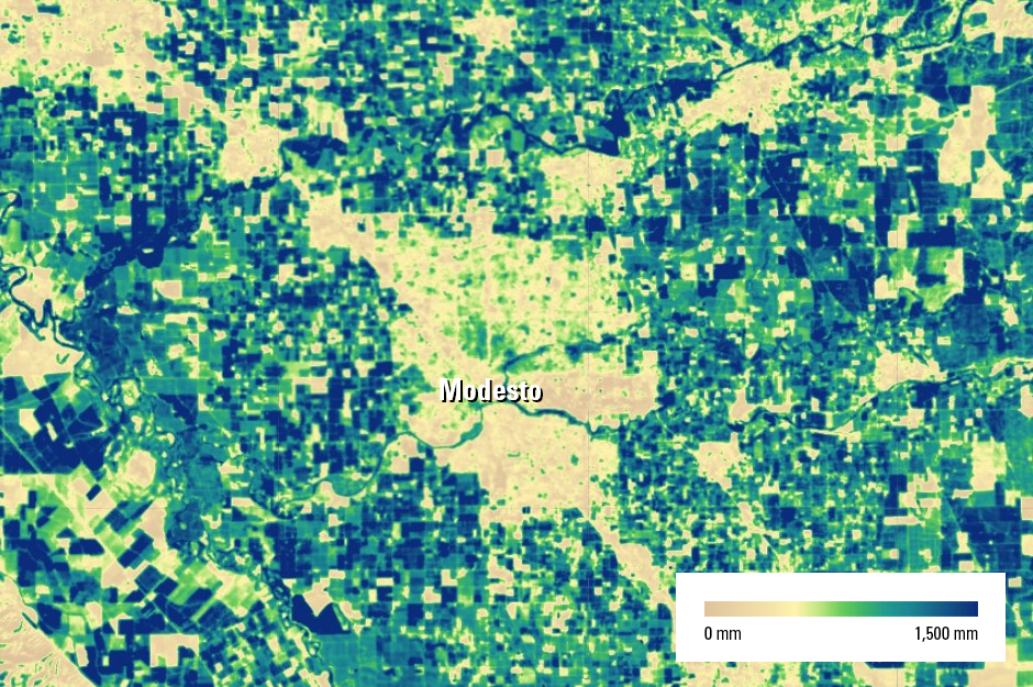 This image is an example of evapotranspiration mapping, centered on Modesto, California, which contains the Gallo Winery headquarters. The area's fields are known for growing a wide variety of crops, including almonds, walnuts, tomatoes and hay. This particular image of 2020 annual actual evapotranspiration (ETa) is provided by the Landsat-based SSEBop (Operational Simplified Surface Energy Balance) ET model, which is one of the models used in the OpenET ensemble.