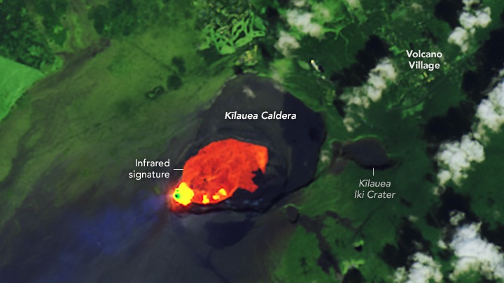 An infrared-color Landsat 8 satellite image of the Kīlauea Caldera, a volcano in Kaluapele Hawaii. White text in this image highlights Volcano Village, the Kīlauea Caldera Kīlauea lki Crater, and infrared signature. This image was acquired on December 24, 2024. 