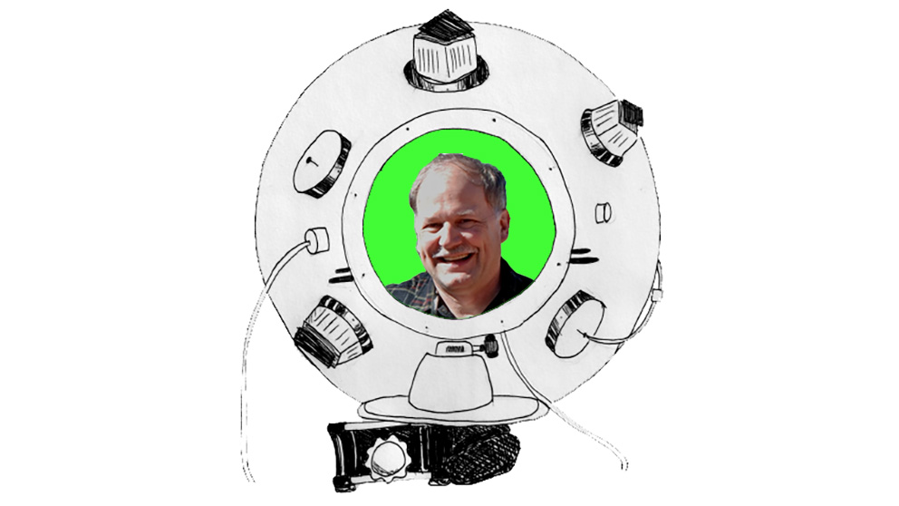 Brian Markham, with the support of Landsat Project Scientists Darrel Williams and Jim Irons, began an integrated approach to Landsat calibration that is still used today. Brian is pictured here inside a cartoon integrating sphere. Integrating spheres are used regularly for pre-launch radiometric calibration and spectral characterization. Artwork credit: Lane Payton