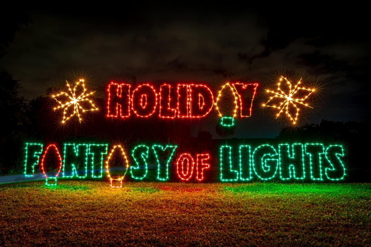 Light display saying Holiday Fantasy of Lights