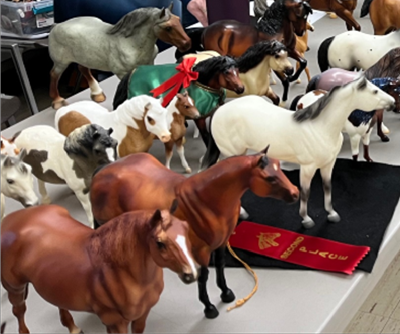 model horses set up on table