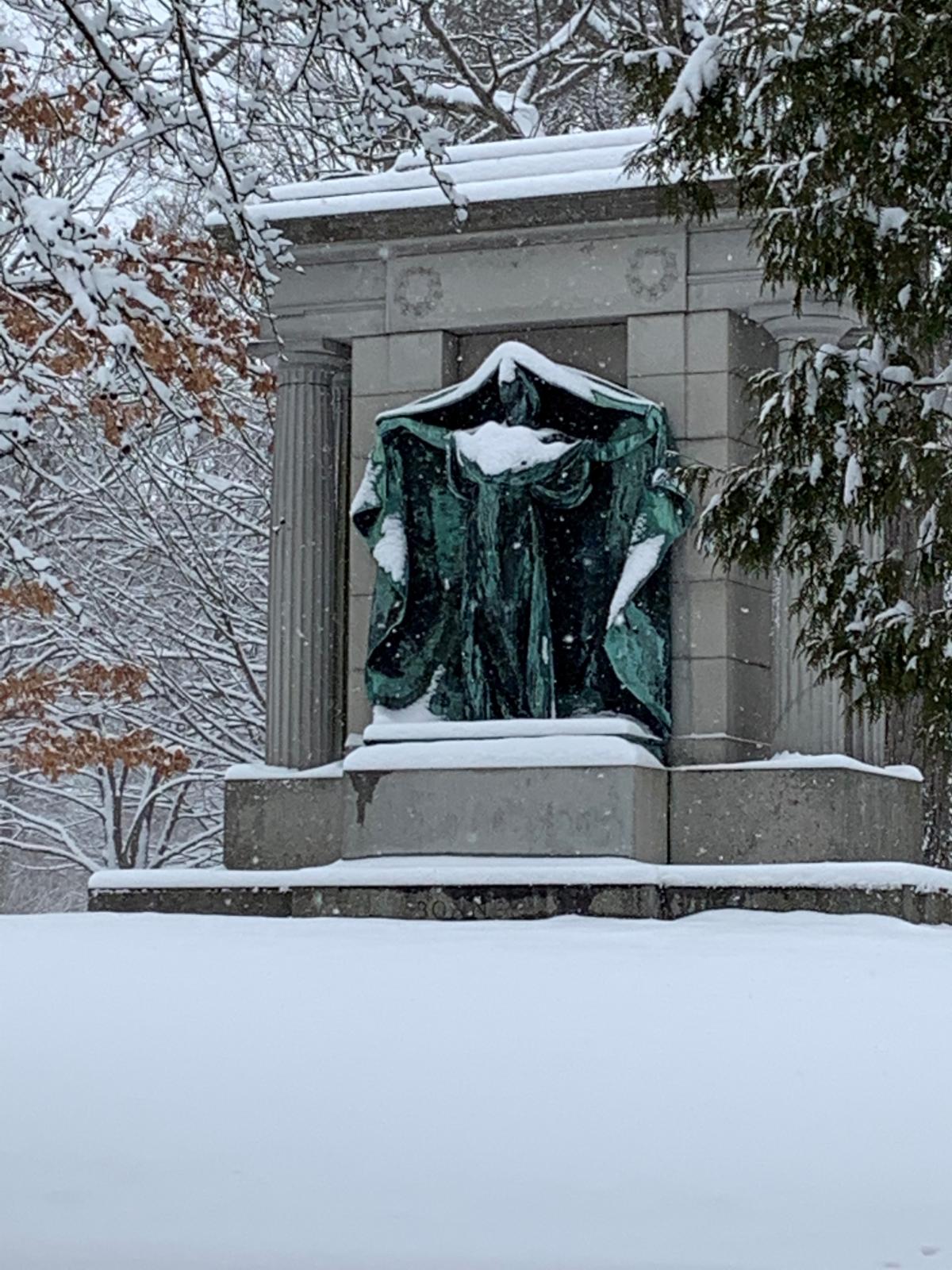 Bonney Monument in Lowell cemetery covered with snow