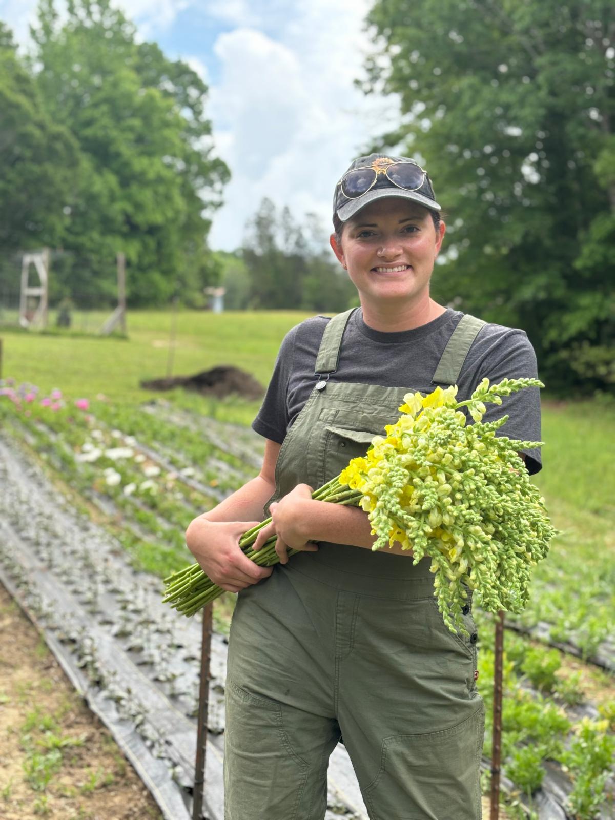Sarah Shuman holding flowers