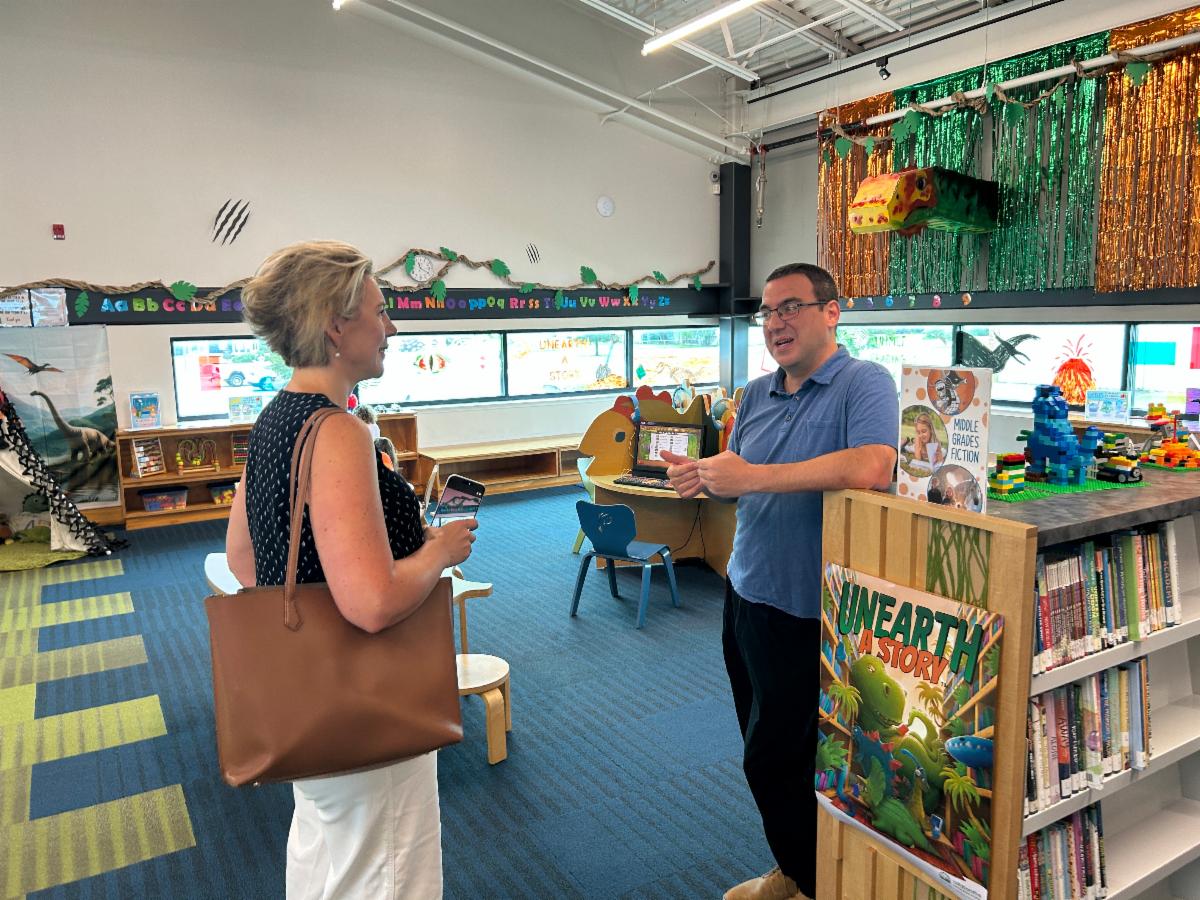 State Librarian Morgan Lehr speaks with Somerset County Library Director Ed Goyda in the Crisfield Library.