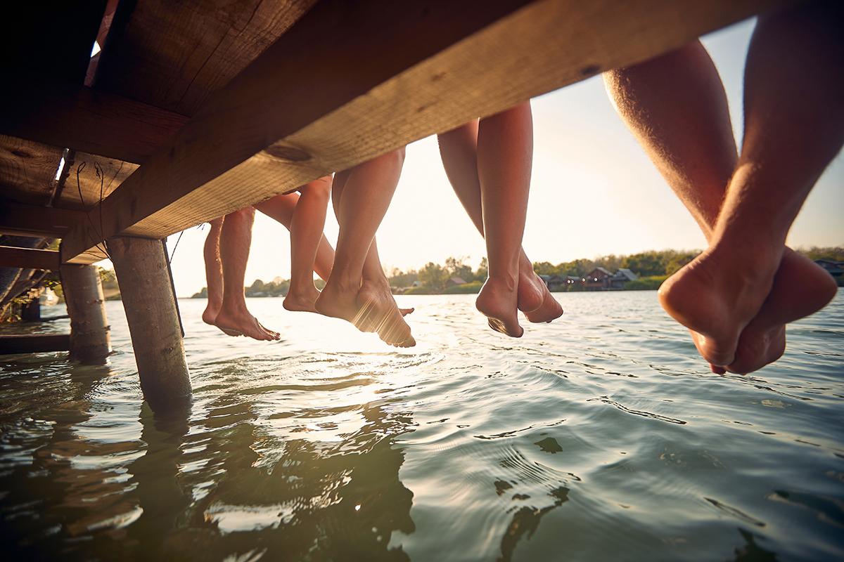 Legs Dangling Off Dock