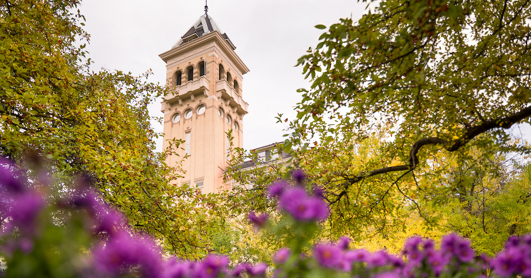 Old Main, framed by spring flowers