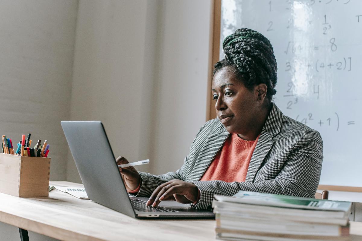 Woman typing on a computer