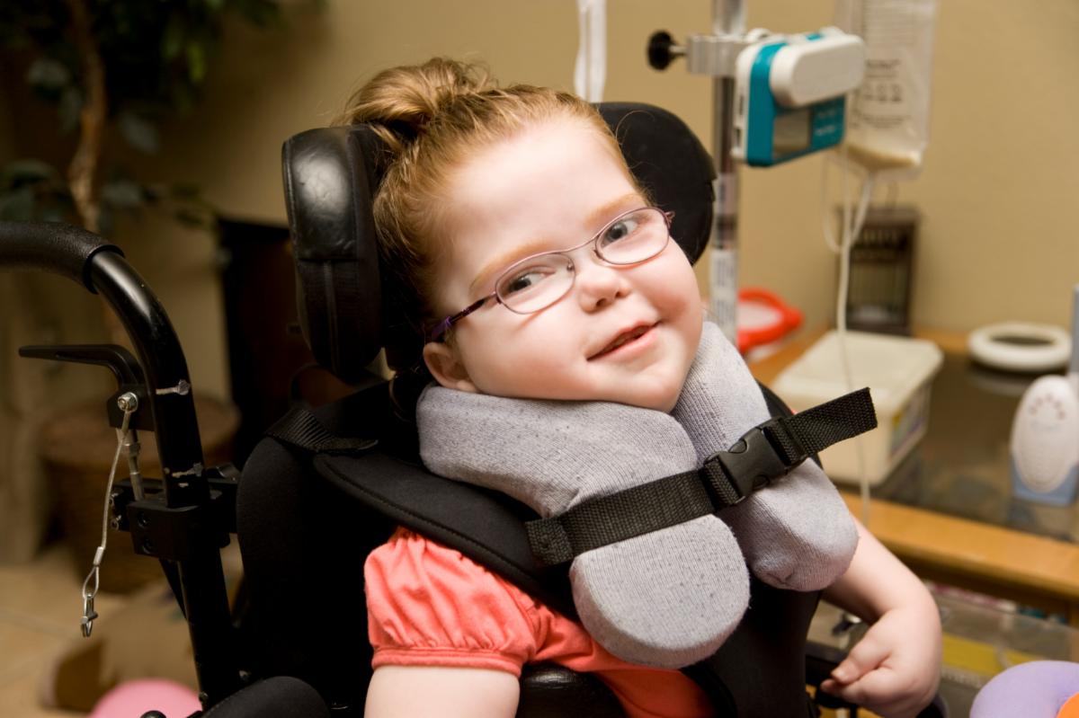 Little girl in wheel chair
