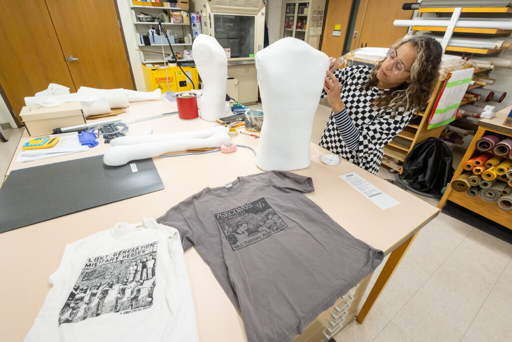 Natalie Granados, conservator for the UConn Library, sews a mannequin together in the library's Conservation Lab on Thursday, April 23, 2026. (Sydney Herdle/UConn Photo)