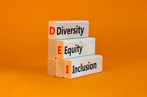 DEI_ Diversity_ equity_ inclusion symbol. Wooden blocks with words DEI_ diversity_ equity_ inclusion on beautiful orange background. Business_ DEI_ diversity_ equity_ inclusion concept.