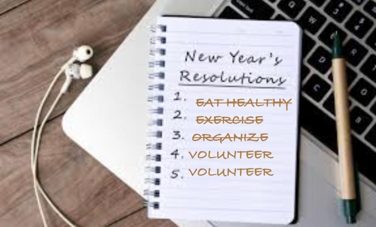 Image of a notepad on a keyboard. Text: New Year's Resolutions 1. eat healthy (scratched out) 2.Organize (scratched out) 4. Volunteer 5. Volunteer