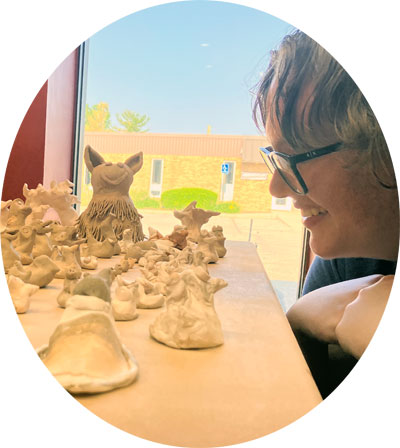 Youth artist Josie Berkley plans glazes